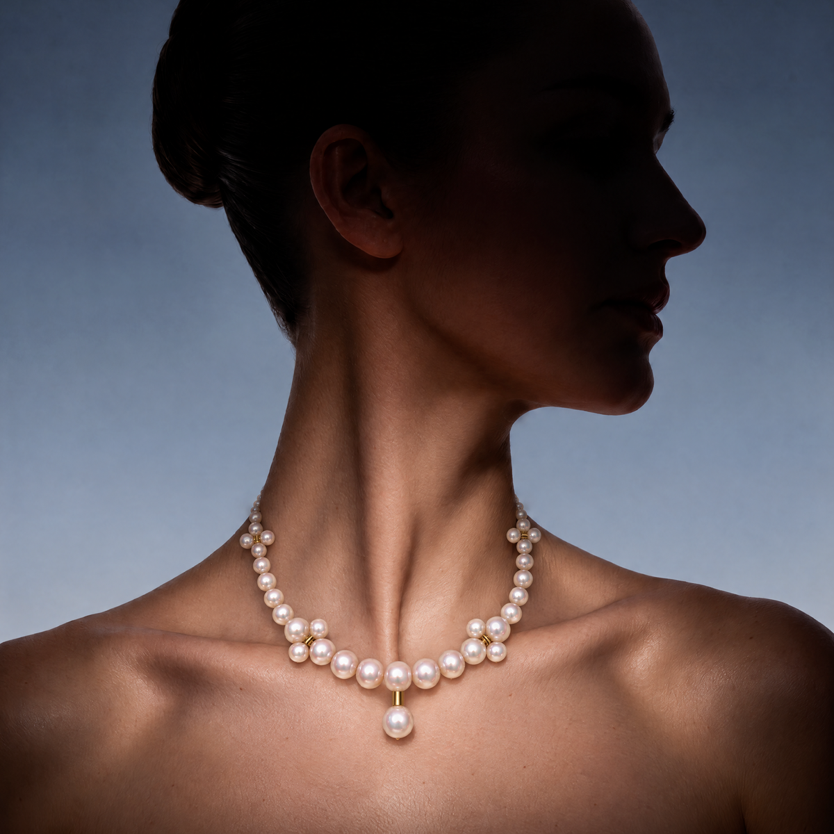 The Barbelle Pearl Necklace worn by a model