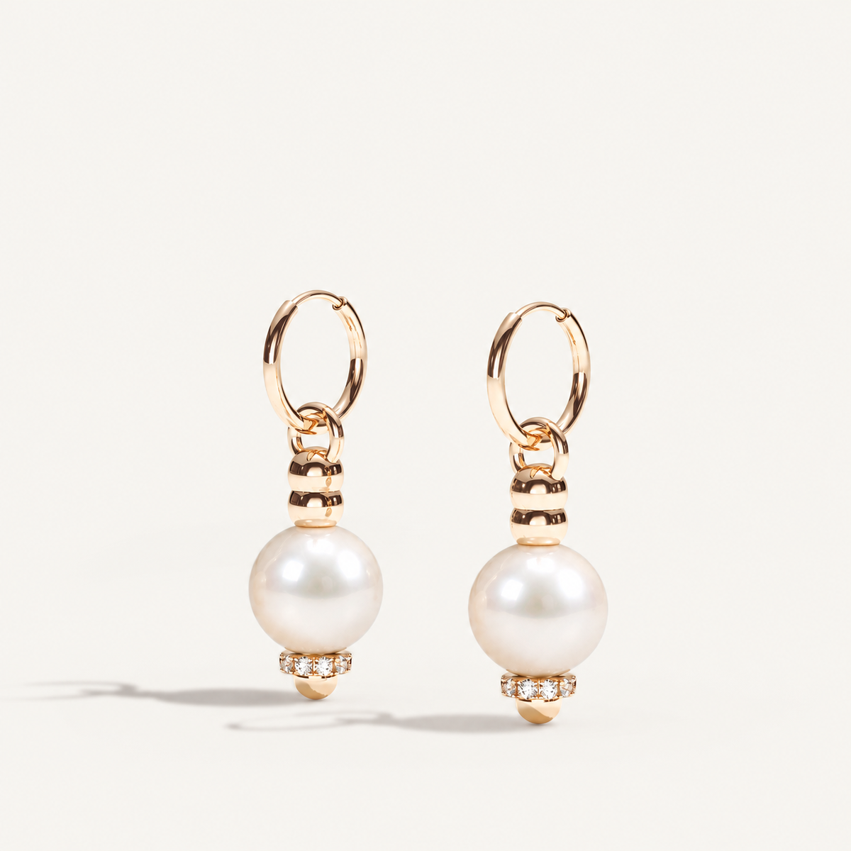Barbelle Creole Ear Pendants – South Sea pearls, rose gold and diamonds. Angled view. Product visualization.