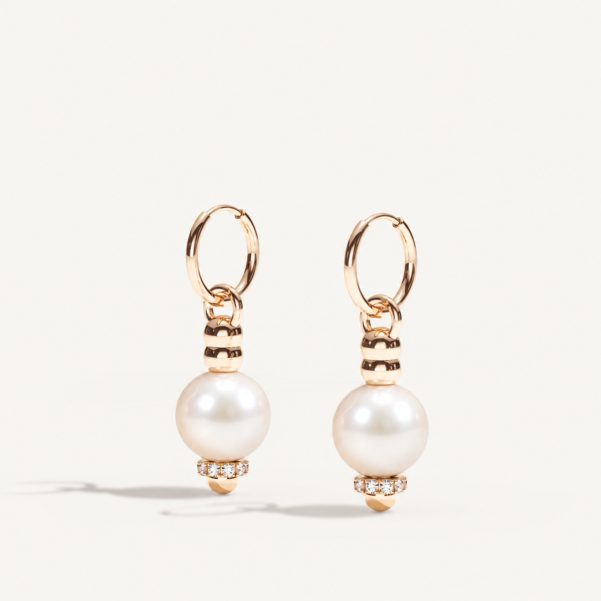 Barbelle Creole Ear Pendants – South Sea pearls, rose gold and diamonds. Alternate angled view. Product visualization.