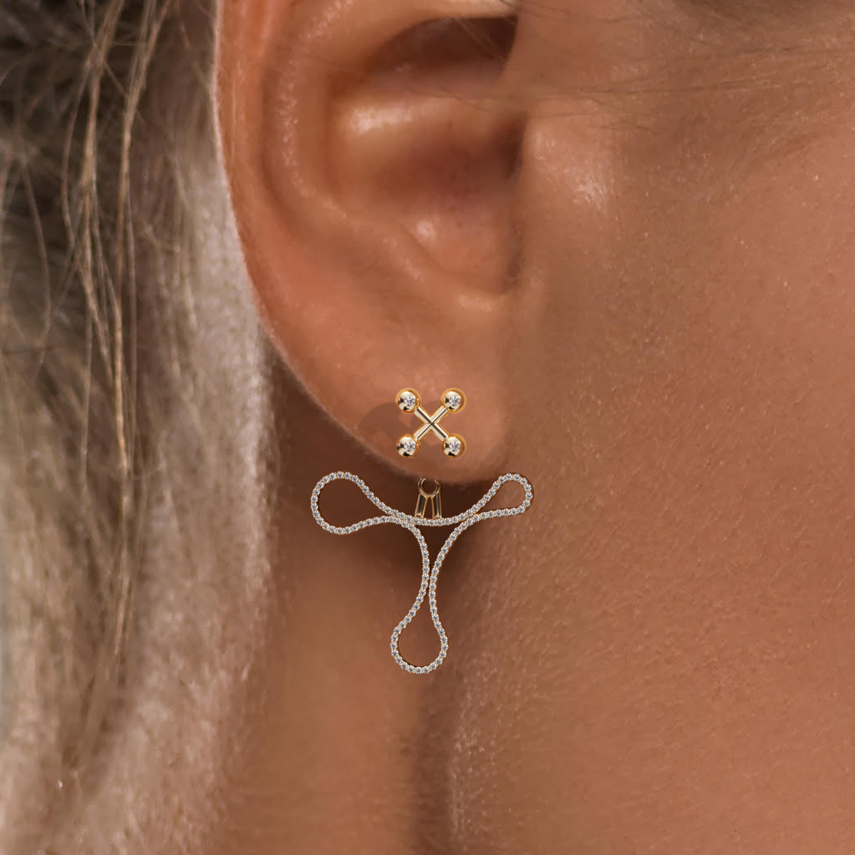 Barbelle Tangle Diamond Ear Pendant in 18K rose gold worn on the ear, diamond detail