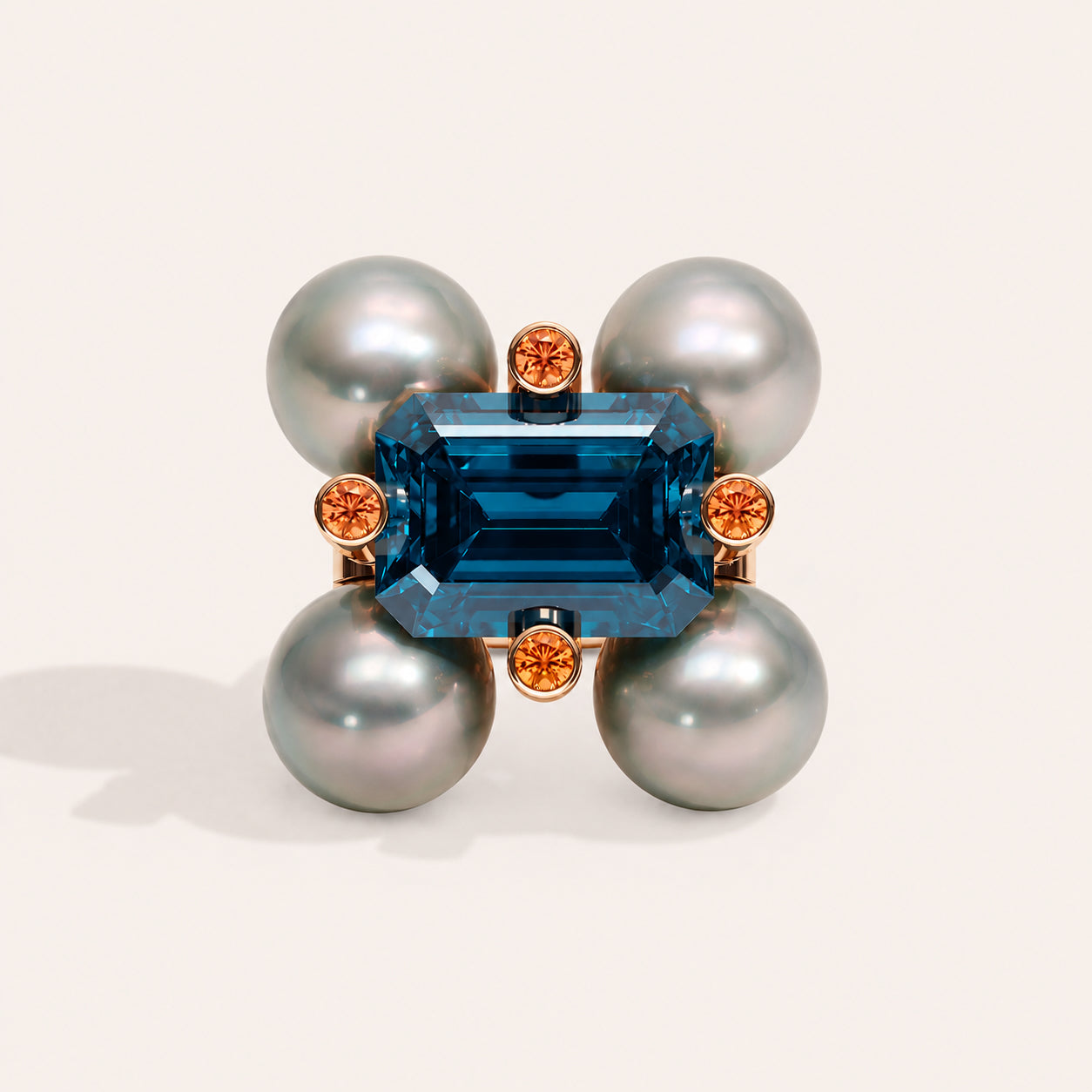 Barbelle London blue topaz, Tahitian pearls and mandarin garnets — front view
