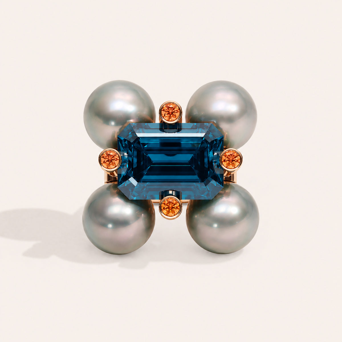 Barbelle London blue topaz, Tahitian pearls and mandarin garnets — front view