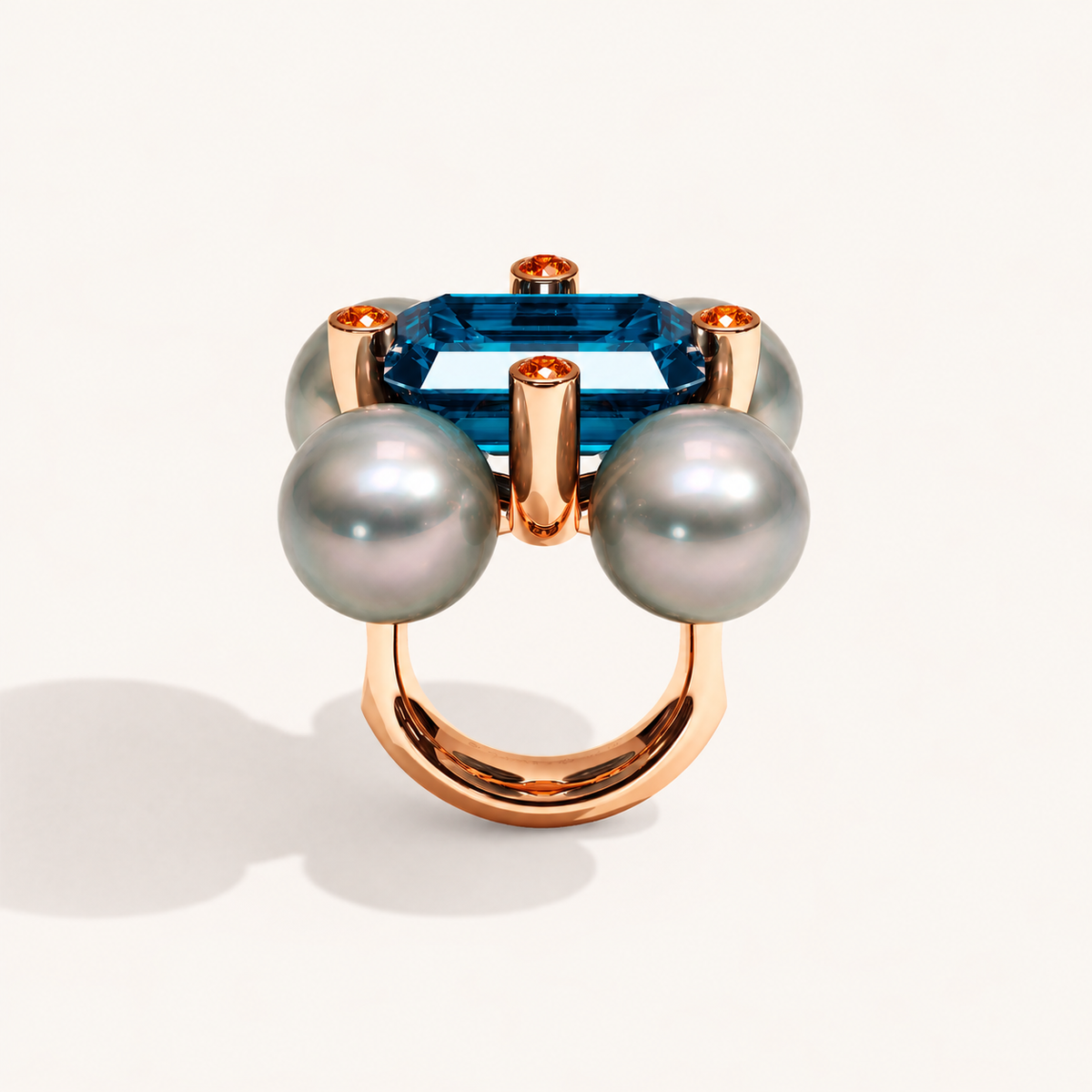 Barbelle London blue topaz, Tahitian pearls and mandarin garnets — profile view