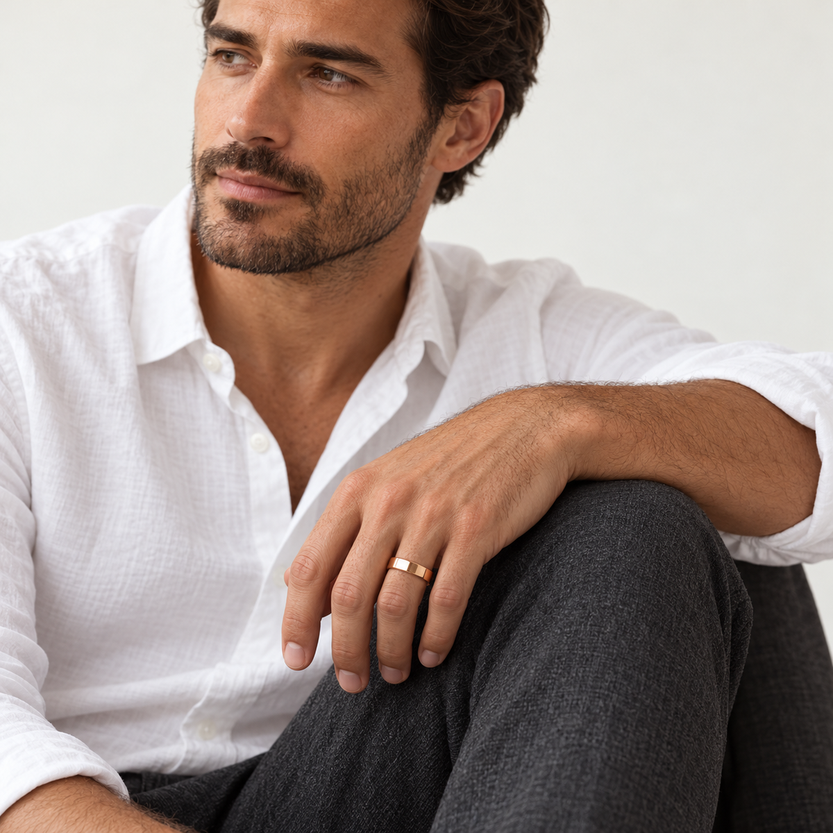 ECHELON 5 mm — male model wearing an 18K rose gold wedding band, AI model illustration