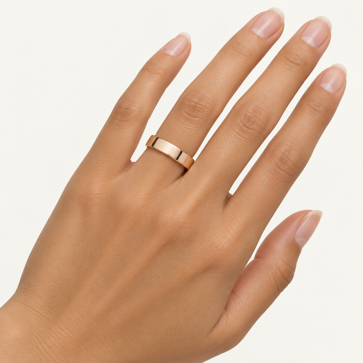 ECHELON 5 mm — woman wearing an 18K rose gold wedding band, AI model illustration