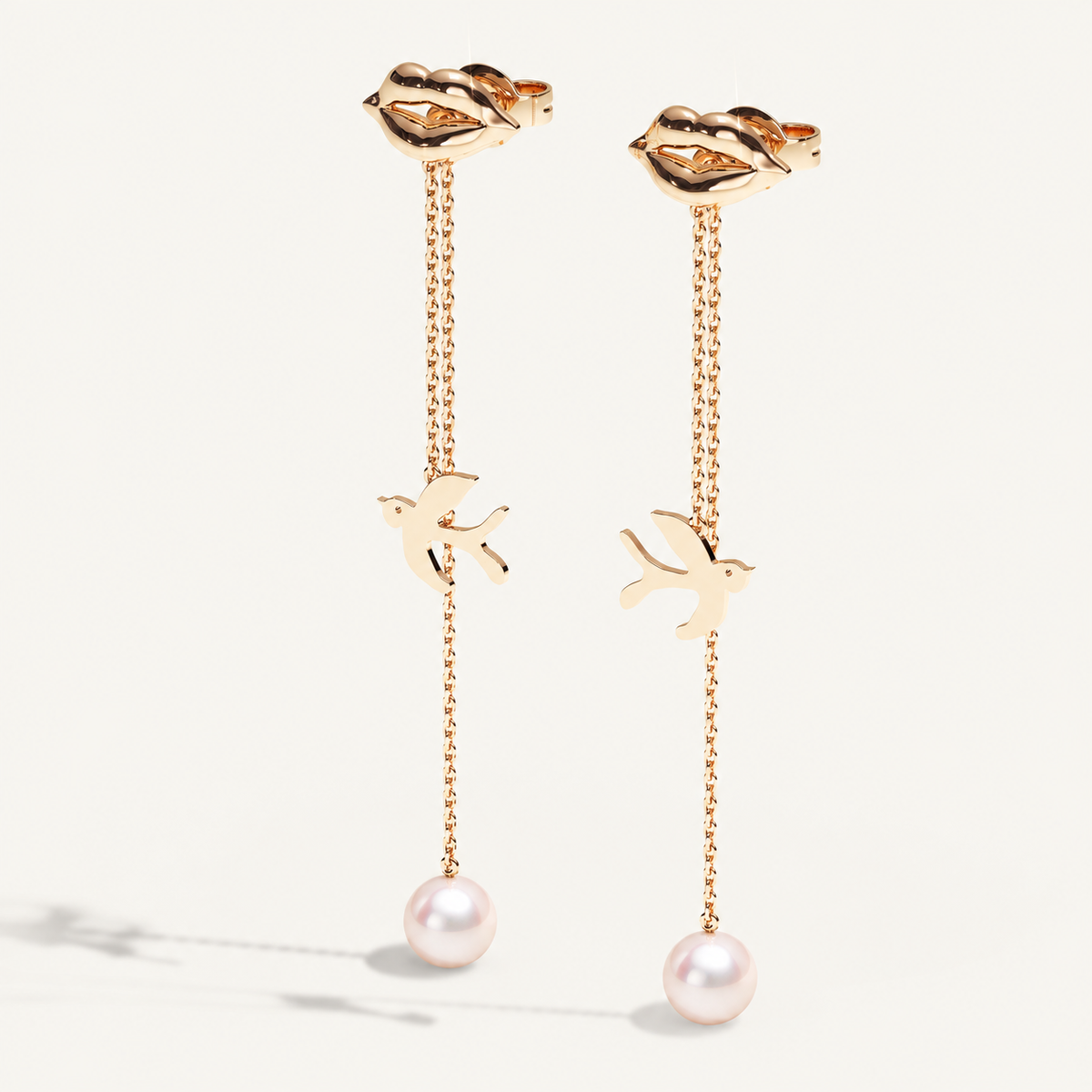 V-Zone Little Nomad Chain Ear Pendants — Akoya pearls, angled view