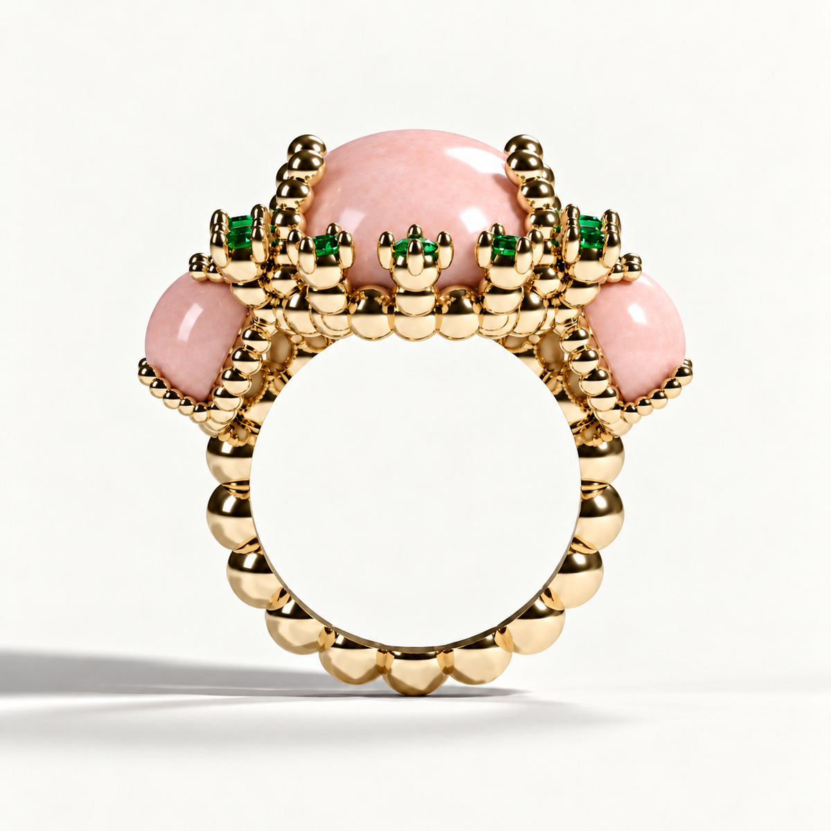 Molecule pink opal and emerald ring — side view