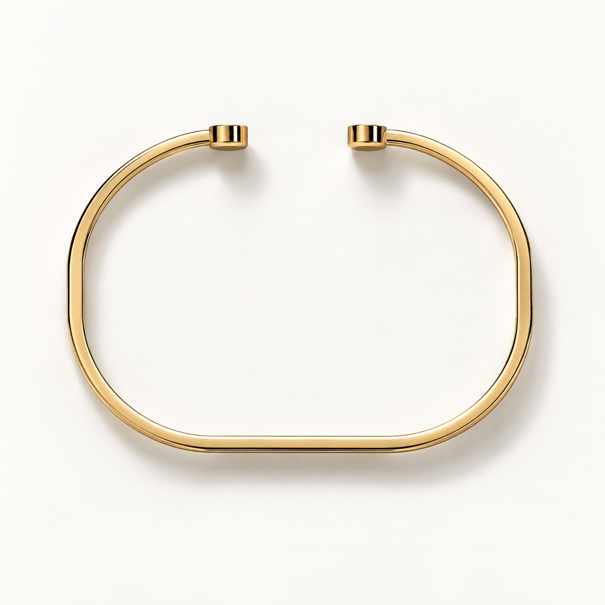 Open Monogram Frame Cuff in polished 18K yellow gold, top view